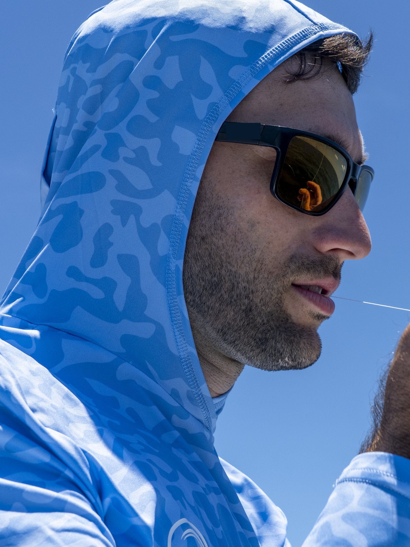 Wet Water performance hoodie on the water